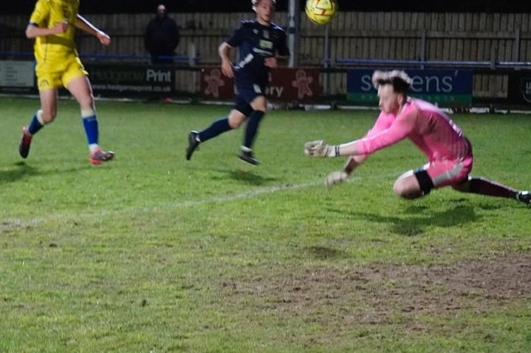 Jack Arthur makes a good save in the first half