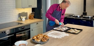 Bishop of Exeter prepares for Easter by baking hot cross buns
