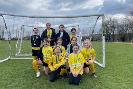 Hatherleigh Primary School's all-girls football team.