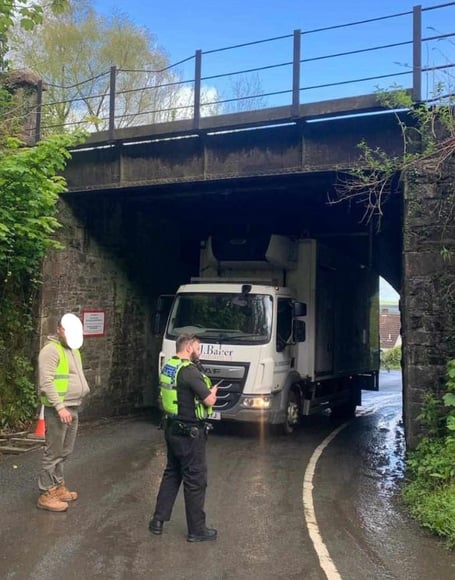 The lorry stuck under a bridge in Okehampton.
