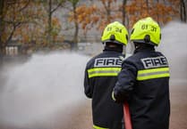 Person rescued from burning building by fire service