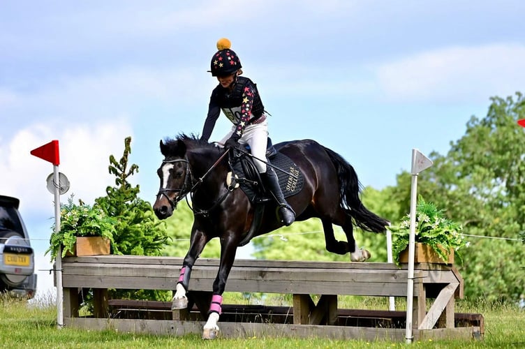 Shebbear College equestrian rider Zola Webber safely over the jump.