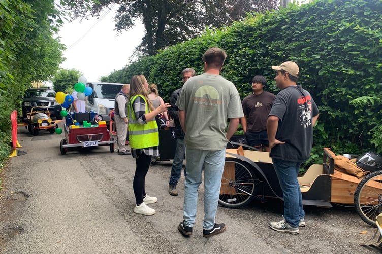A safety briefing for the competitors who lined up to take part in the fourth annual soapbox derby at Gunnislake's Rising Sun Inn. (Picture: Sarah Martin)