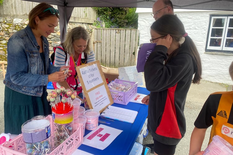 A raffle stall among the traditional attractions at Buckland Summer Fair. 
