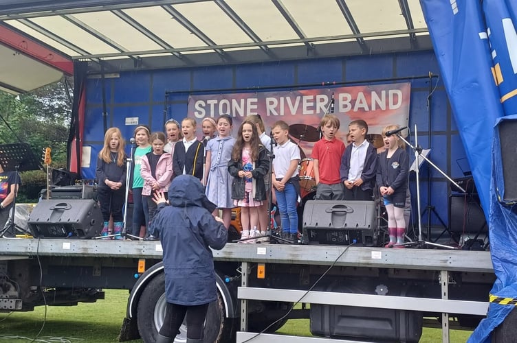 A children's singing group entertained visitors at the Tamar Valley Fete. Picture by J Trapp.