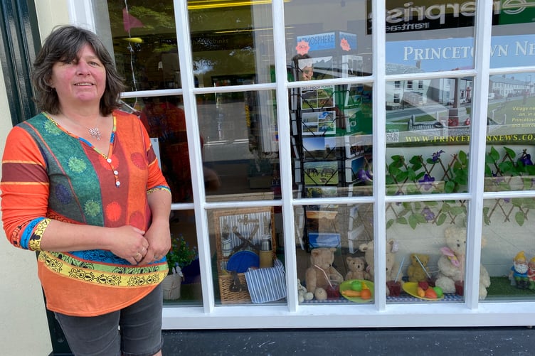 Creative shopkeeper Jane Liversidge is appreciate for her imaginative window displays at Princetown Post Office.
