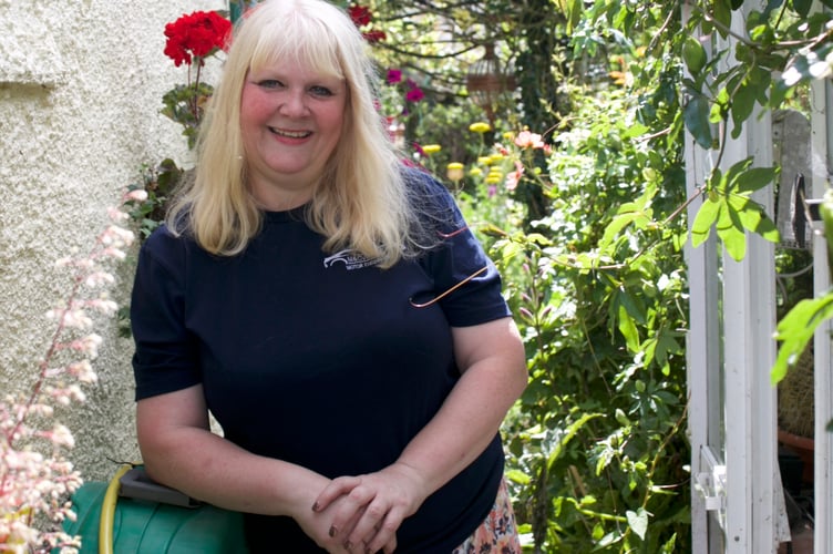 Claire White and her husband Mark have created a 'home outdoors' as a garden with many parts in Lamerton. Picture by Jude Wright.