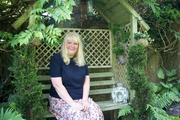 Claire White and her husband Mark have created a 'home outdoors' as a garden with many parts in Lamerton. Picture by Jude Wright.