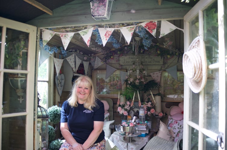 Claire White and her husband Mark have created a 'home outdoors' as a garden with many parts in Lamerton. Picture by Jude Wright.