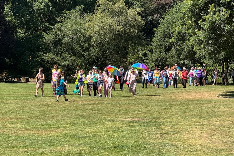The front of the group of walkers in Simmons Park on Okehampton Pride day.  AQ 6493
