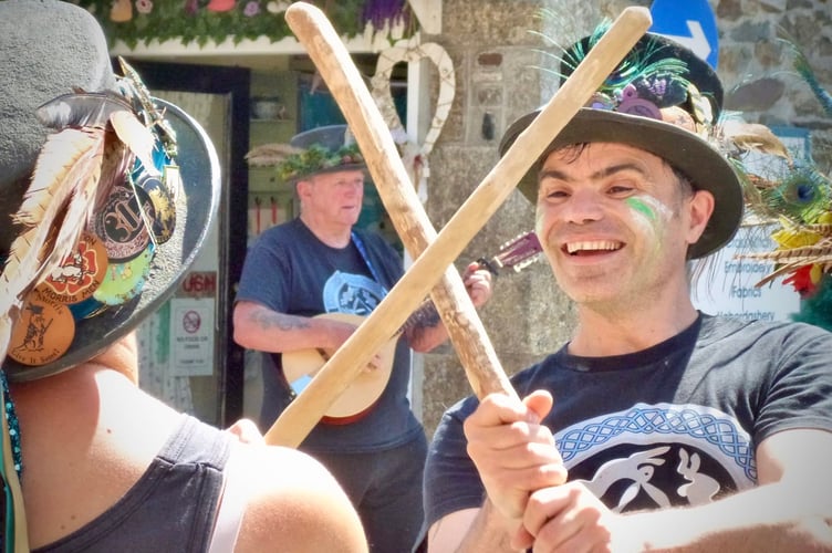 The energetic dancers and musicians of Lodestone Border Morris kept up the dancing in the heat at the Tavi Fringe.