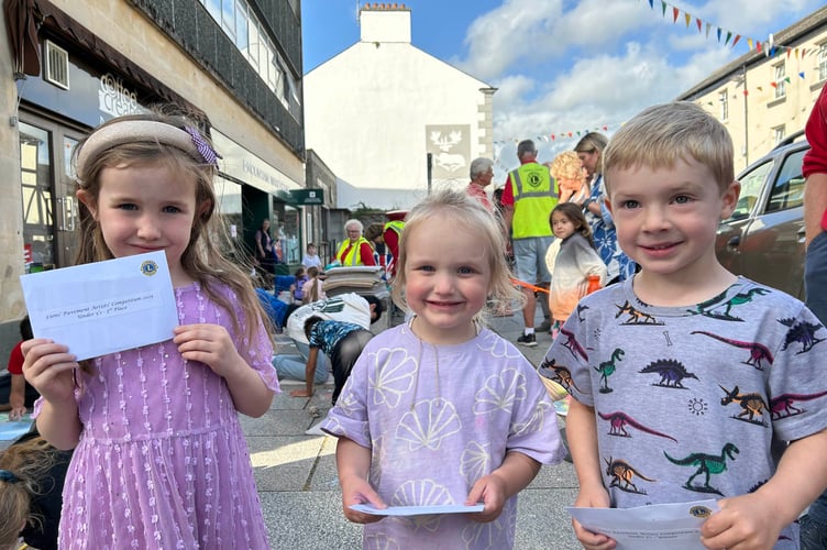 Pictured are the Under 5s pavement art winners: Chloe McCormick, third; Olivia Thorne, second; and Lucas Ball, first.