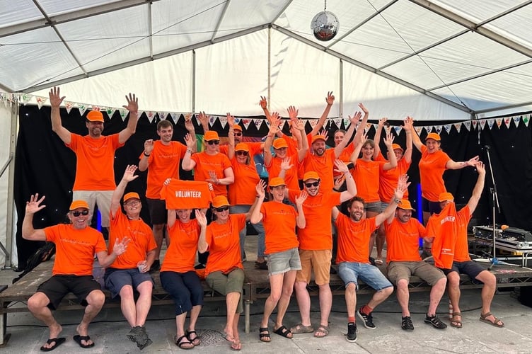 The Hatherleigh Festival volunteers applaud their efforts.
