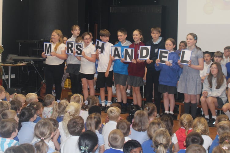 An emotional farewell was paid to Laura Handel, the retiring head of Tavistock Primary today at a special assembly by children who sang personalised versions of her favourite songs that they sung together. 