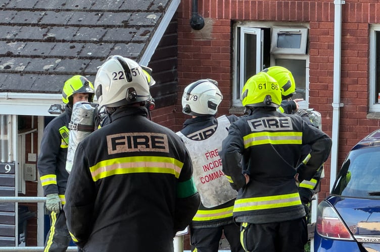 Firefighters at the Crediton property fire on Sunday, July 27.  AQ 7777
