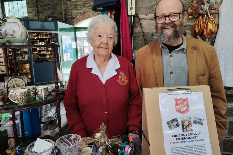 Former missionary Joan Williams, pictured with her son Chris,has thanked the generous people of Tavistock for supporting her pannier market stall which has raised funds for orphans in India.