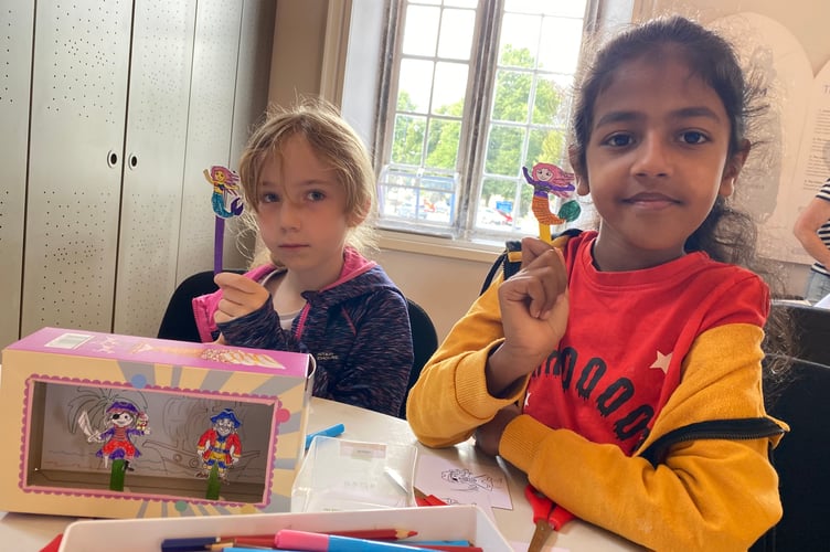 Friends Millie Hanson, 7, and Amy Tojo, 8, at a pirate-themed school holiday event at Tavistock Guildhall courtroom. There are different themed weekly events at the courtroom.