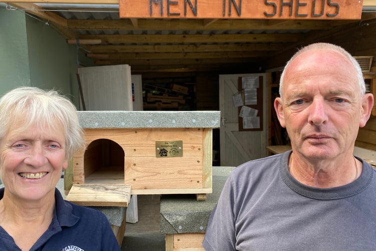 Pam Pemberton, of Greatfield Hedgehog Rescue charity thanks Paul Green, of Tavistock Men in Sheds charity.