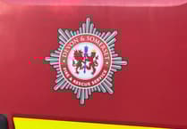 Fire crews tackle overnight barn fire at Sydenham Damerel