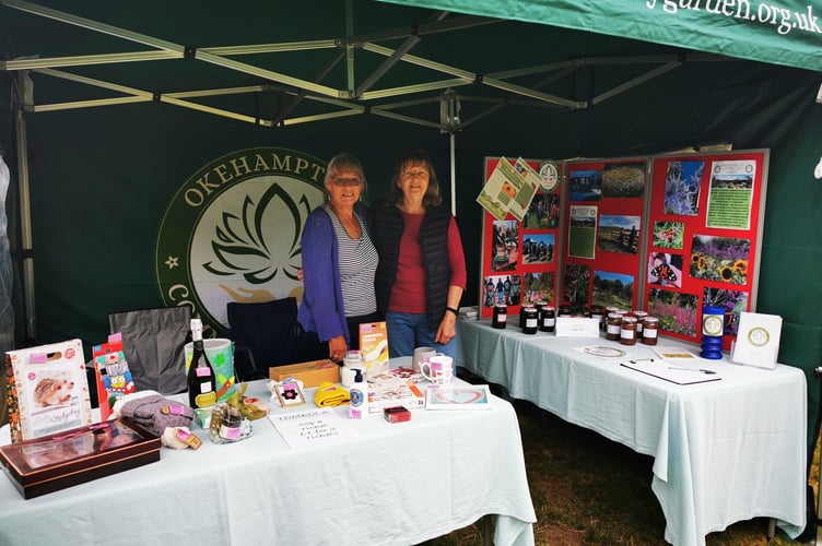 Jeanette Chilcott and Rikki Whittle on the Okehampton Community Garden Stall at the Rotary Fair.