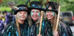 Morris dancers shaking bells to mark 20 years 