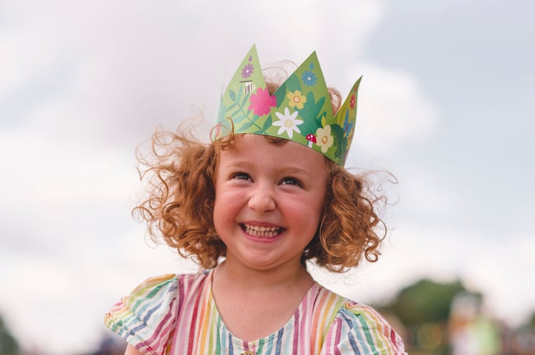 Wearing a crown as part of Summer of Play.