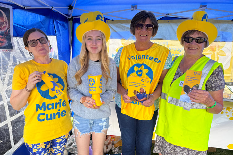 Collecting for the charity Marie Curie at Dartmoor Folk Festival. AQ 9060