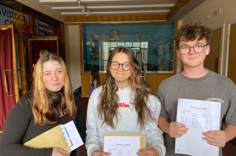 Ebony Bailey, Polly Thornton and Freddie Alford with their A-level results at Tavistock College.