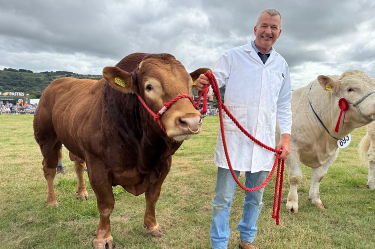 Gary and Lorraine Dunn of Highridge, Sampford Courtenay, won the Champion Limousin class with Highridge Oscar.  AQ 0181

