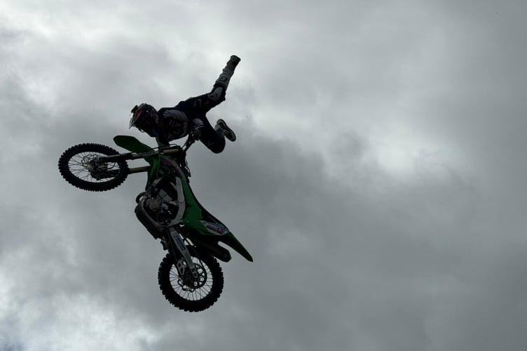 Jamie Squibb during his motorcycle stunt display. AQ 9849