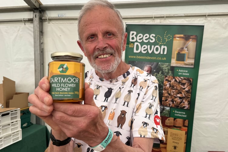 Peter Hunt of Blackaller Bees, North Bovey, Newton Abbot sold Dartmoor Wild Flower Honey at Chagford Show. AQ 1075