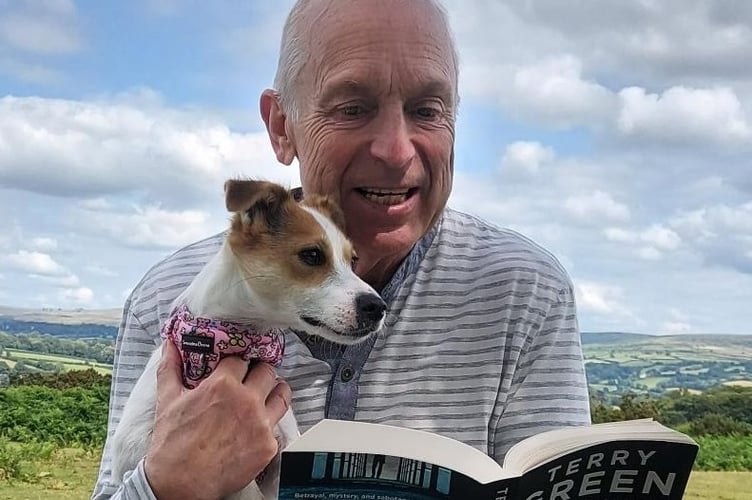 First-time thriller writer Terry Green reads from his new novel with dog Gracie.