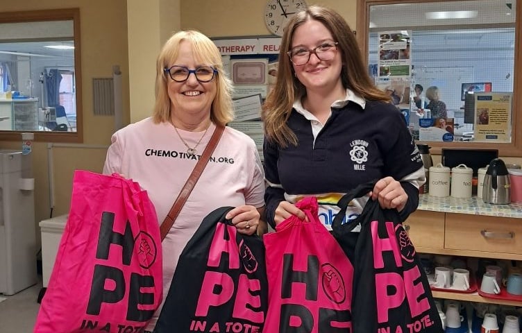 Marian Southwick and Millie Dennis from Lewdown YFC at the Cherrybrook Unit at RD Exeter.