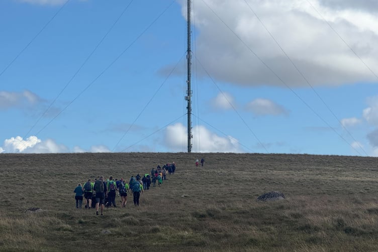 Charity trekkers raising money for Tavistock Dartmoor Search and Rescue by taking part in the 11 Tors run and walk.