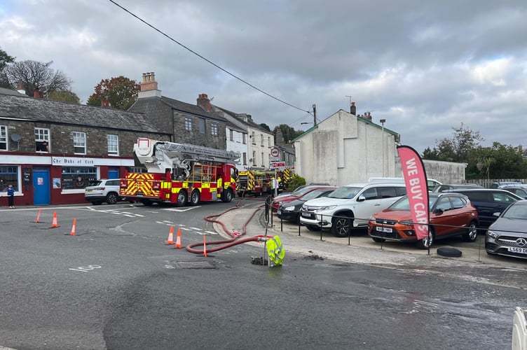 Firefighters tackling the fire in Ford Street. Picture: Contributed