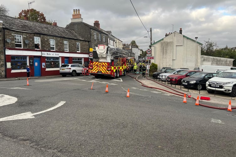 Firefighters tackling the fire in Ford Street. Picture: Contributed