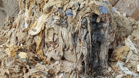 A so-called fatberg, comprising fat and wet wipes, which is blocking drains. Residents are asked to bin fat and wet wipes top avoid flooding and blockages.