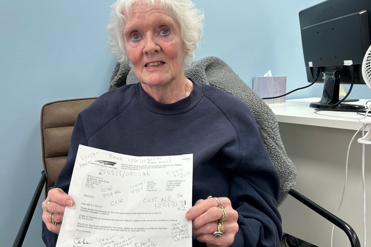 Gill Wyatt of Bere Alston with the letter from South West Water sending a refund cheque from her late husband. Despite numerous calls and letters she has still not obtained a refund cheque from SWW in her own name.