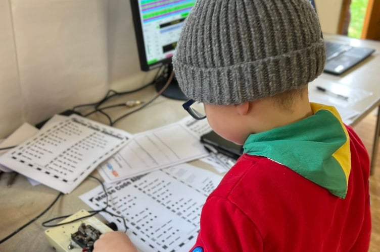 Youngsters from Walkhampton Scouts, Beavers, Squirrels and Cubs reached across the world through radio.