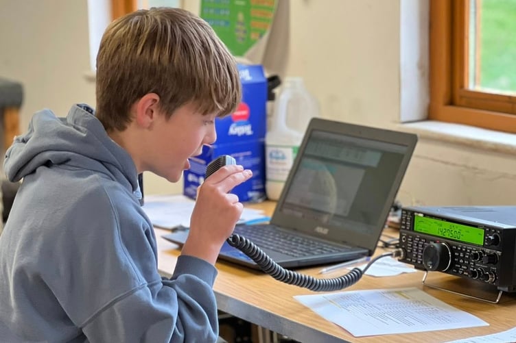 Youngsters from Walkhampton Scouts, Beavers, Squirrels and Cubs reached across the world through radio.