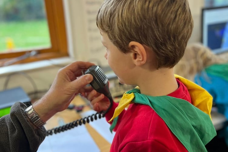 Youngsters from Walkhampton Scouts, Beavers, Squirrels and Cubs reached across the world through radio.