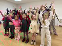 Youth choir reaching the high notes