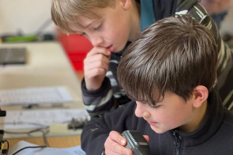 Youngsters from Walkhampton Scouts, Beavers, Squirrels and Cubs reached across the world through radio.