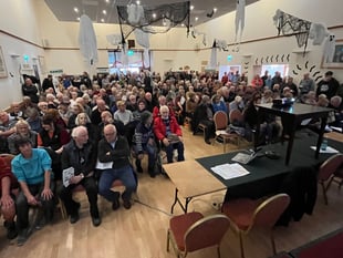 Hundreds turn out to oppose massive solar farm plan
