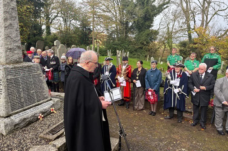 Canon Tim Newcombe opened the service