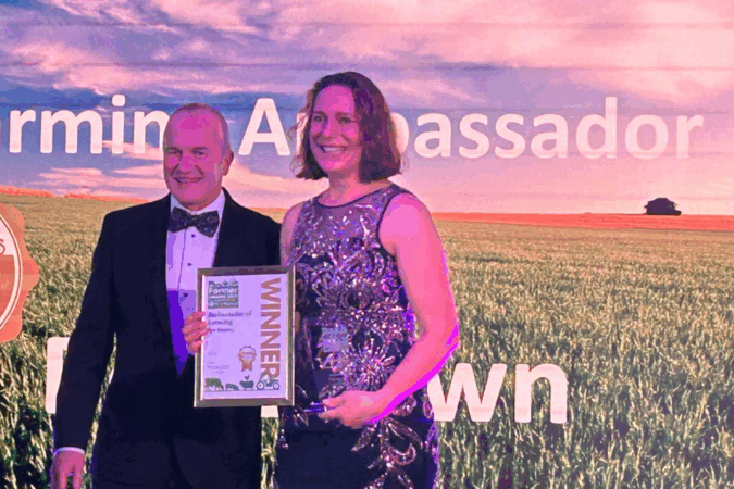 Bev Brown receiving her award.