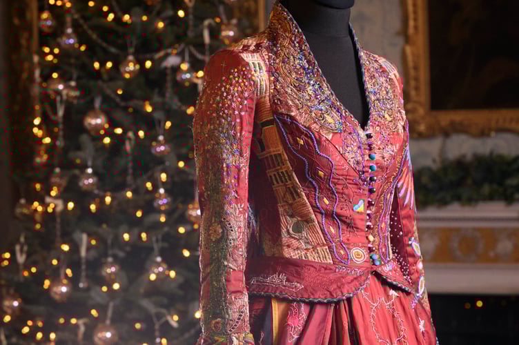 This sensational red dress, with Somerset creator Kirstie Macleod, is on display at Christmas at NT Killerton House, near Exeter, from Saturday, November 29. Picture by Steve Haywood.