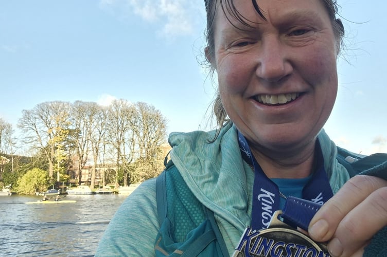 Okehampton Running Club runner Pearl Barnes with her medal after completing the Kingston 10k on Sunday, coming third in her age group.