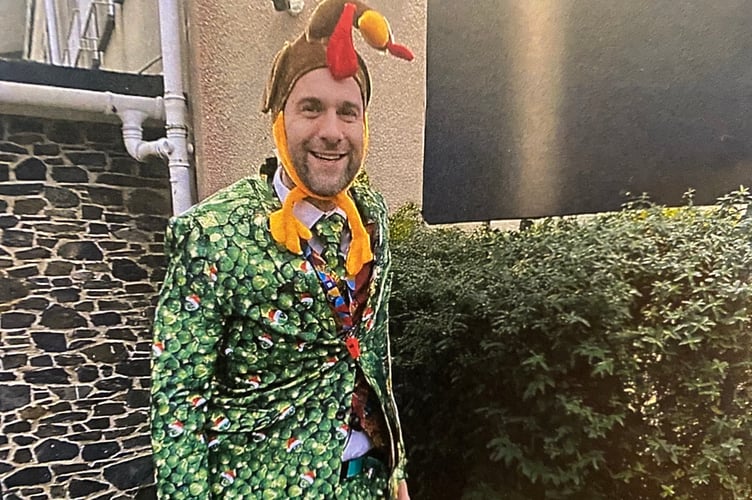 The late James Stroud, who died in August this year. He is dressed in his famous Christmas sprout suit. A tree is dedicated to his memory at Tavistock Christmas Tree Festival.