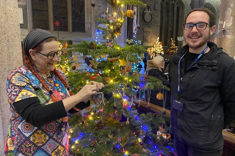 Tavistock Christmas Tree Festival: Kelly College students made pottery shields of their college crest on their tree.